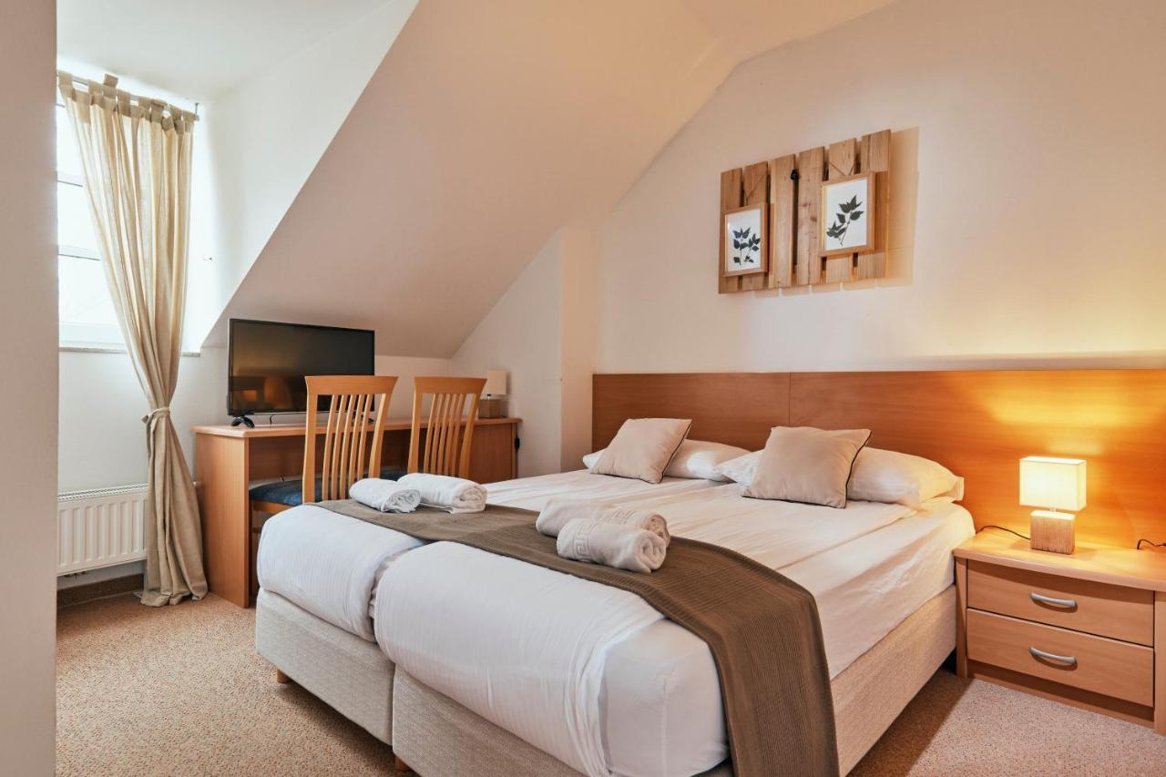 Rooms & Restaurant Ostarija โดเลนิสเก ทอปลิตเซ ภายนอก รูปภาพ
